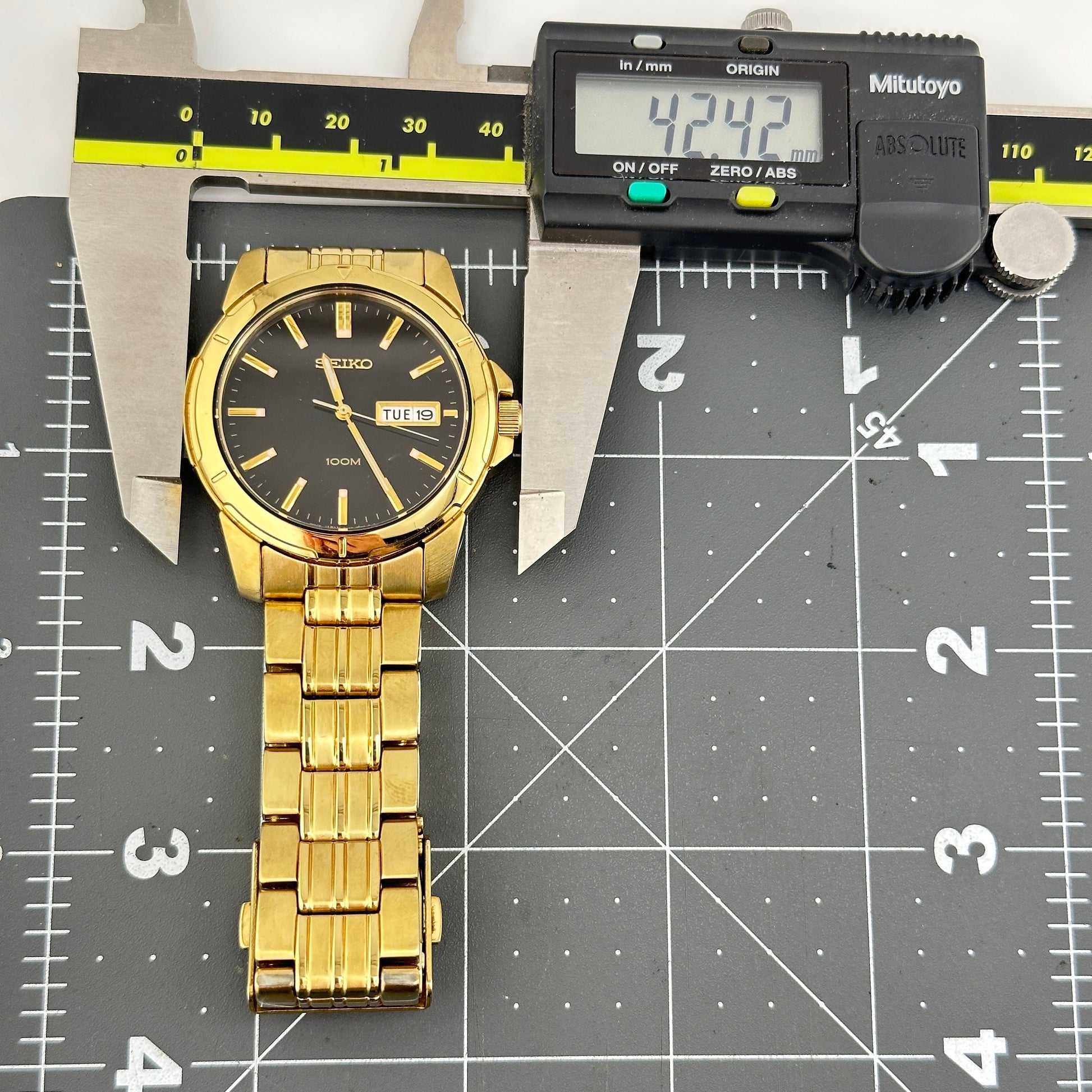 Seiko 100m Gold Tone Day Date Men’s 42mm quartz watch
