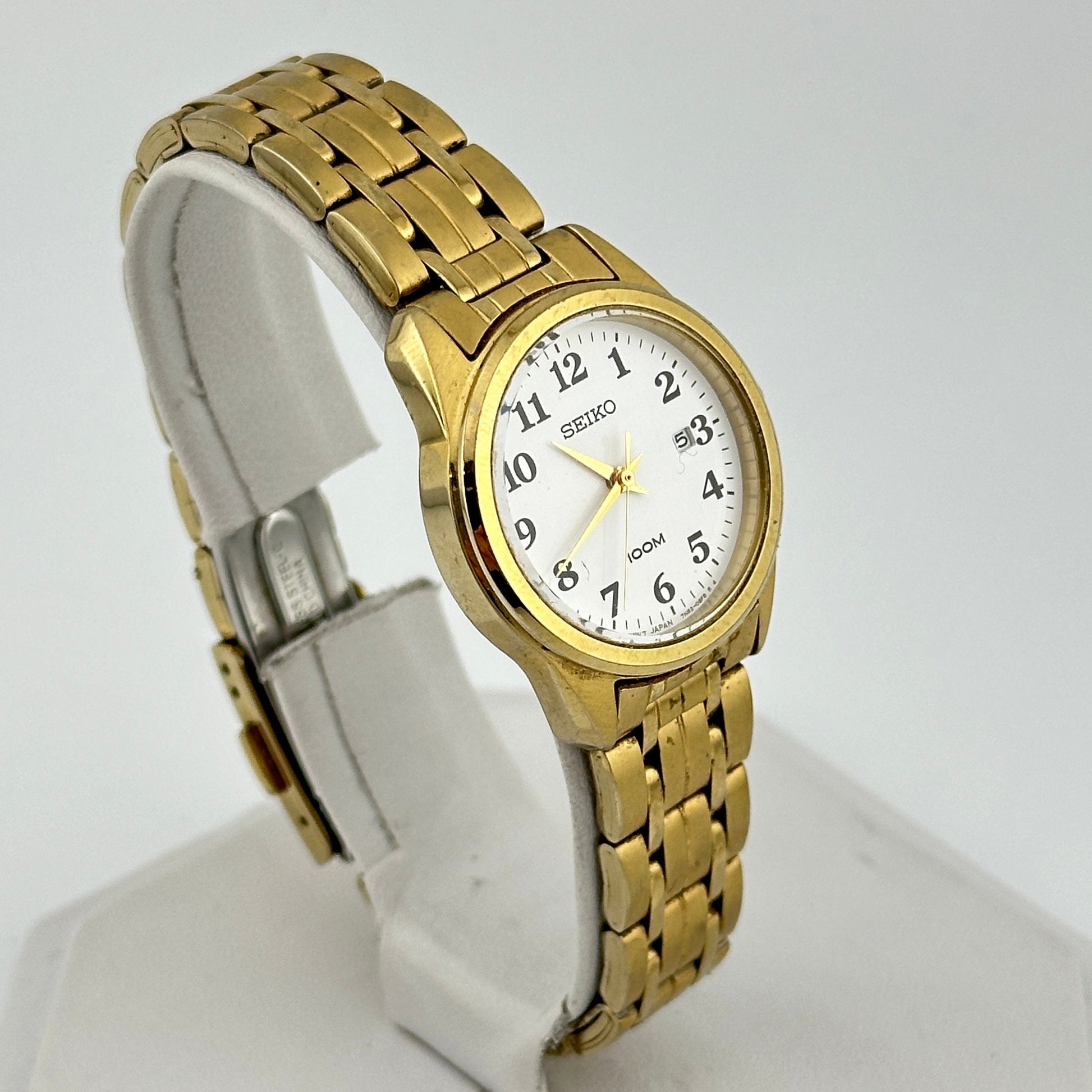 Seiko 100M Gold Tone White Dial Ladies 28mm Quartz Wristwatch c. March 2002