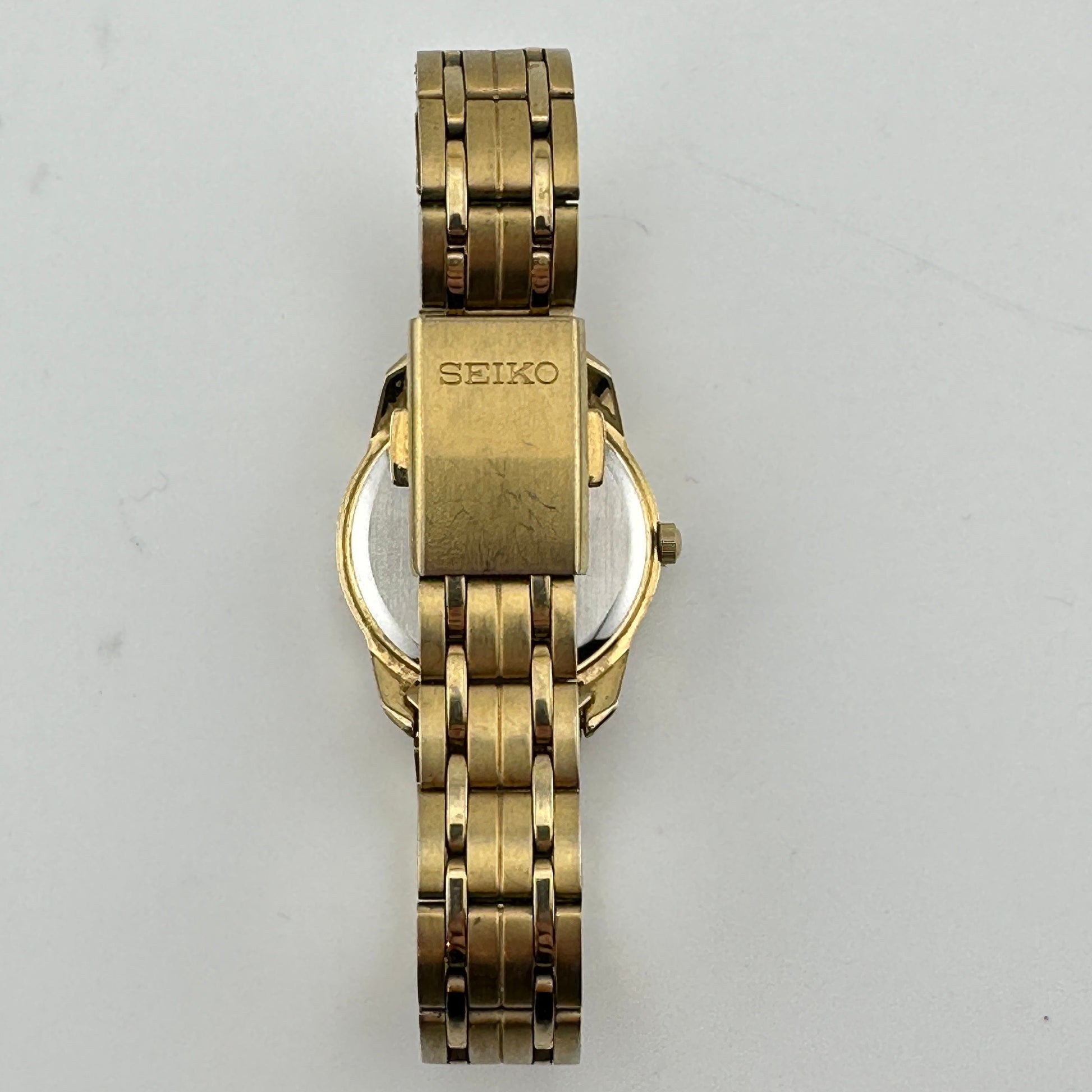 Seiko 100M Gold Tone White Dial Ladies 28mm Quartz Wristwatch c. March 2002