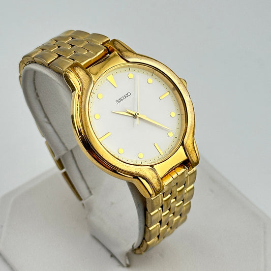 Vintage Seiko Gold Tone Day Date Midsized 35mm quartz Watch c. Aug 1996