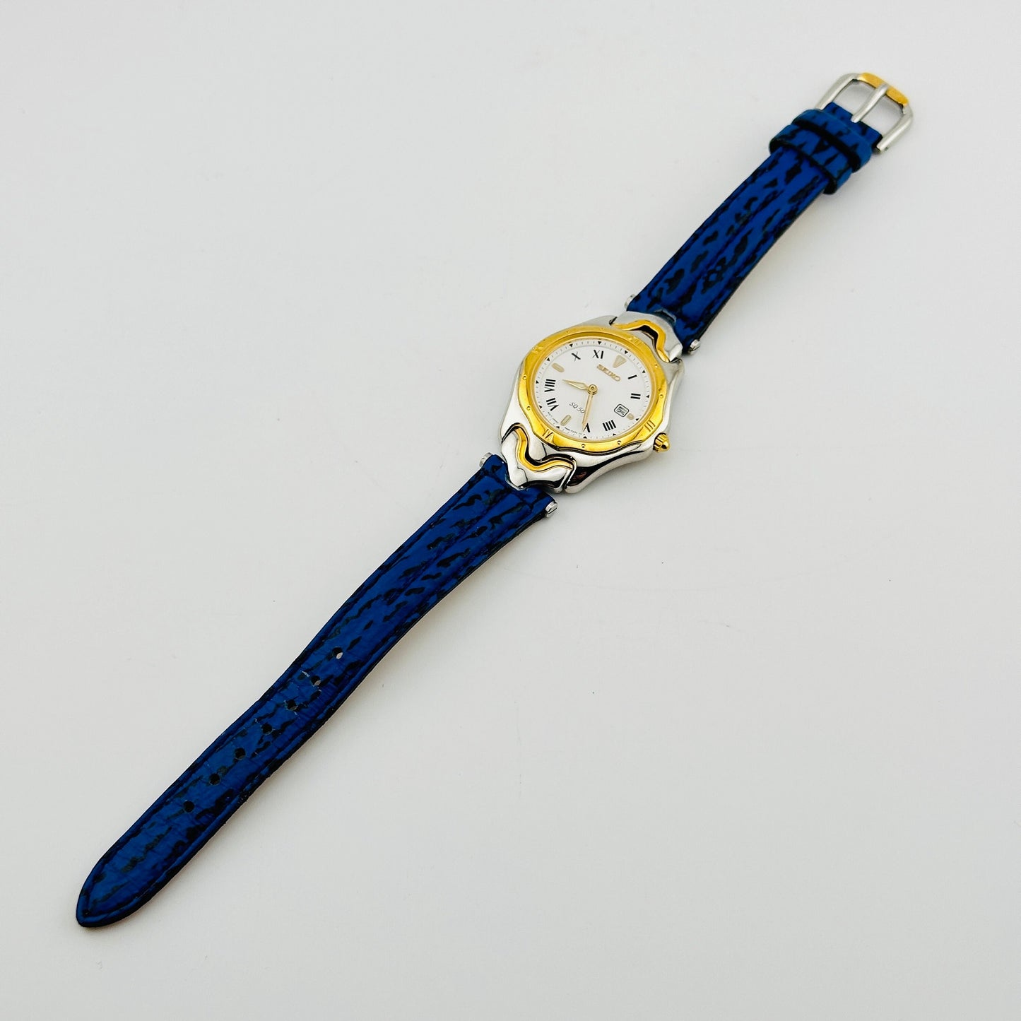 Seiko SQ 50 White Dial Gold Tone Ladies Quartz Wristwatch with Original Blue Strap