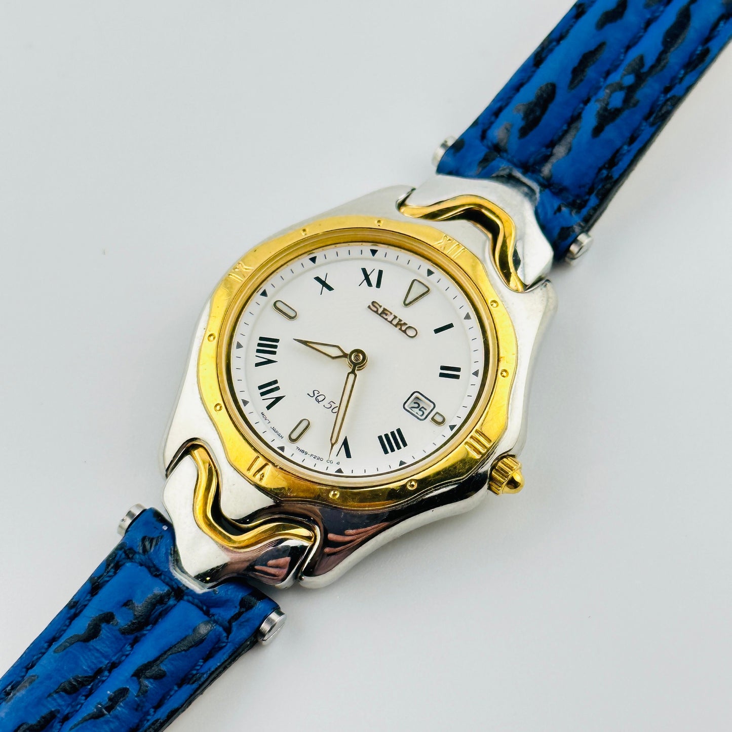 Seiko SQ 50 White Dial Gold Tone Ladies Quartz Wristwatch with Original Blue Strap