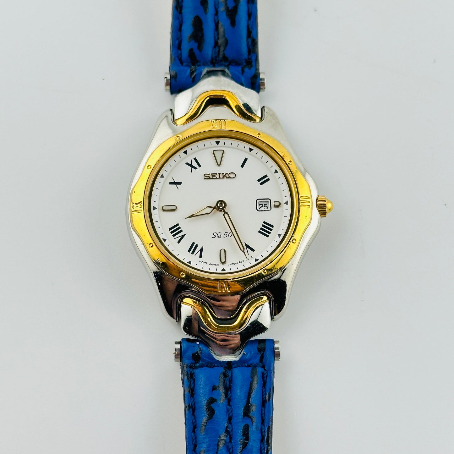 Seiko SQ 50 White Dial Gold Tone Ladies Quartz Wristwatch with Original Blue Strap