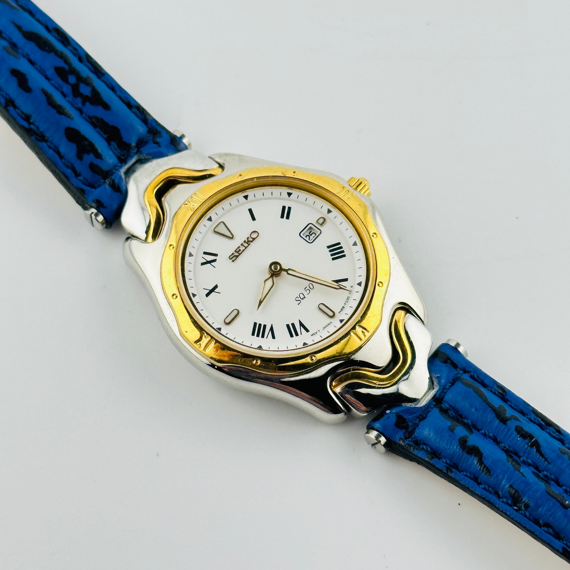 Seiko SQ 50 White Dial Gold Tone Ladies Quartz Wristwatch with Original Blue Strap